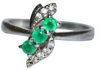 emerald and diamond engagement ring