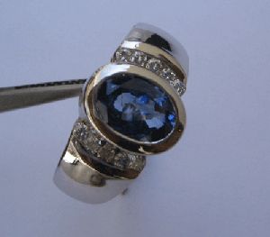 Sapphire oval and Diamond white gold ring
