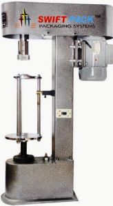 CAP LOCKING MACHINE