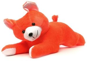 ORANGE LYING TEDDY BEAR