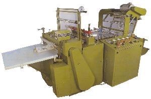 AUTOMATIC BOTTOM CUTTING AND SEALING MACHINE