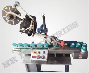 Top labeling machine