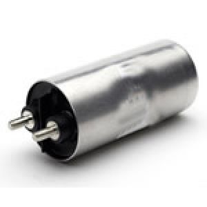 Capacitors with over-moulded connectors