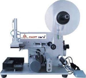 FLAT BOTTLE LABELING MACHINE