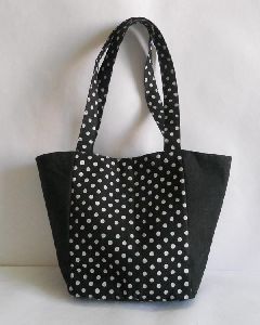 Black color Screen printed and plain dyed canvas fabric bag elegantly designed