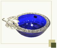 Blue glass bowl with silver antique leaf