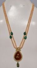 latest design natural pear shape onyx kundan polki with emerald drop pendant