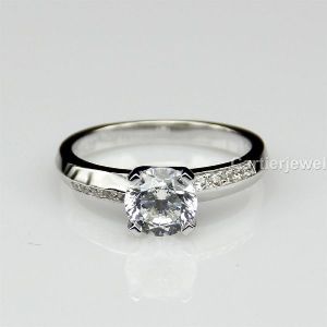 white round moissanite Knife edge engagement ring in 925 sterling silver