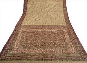 golden colored hand embroidered painted net sari