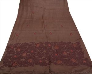 purple colored embroidered pure silk sari