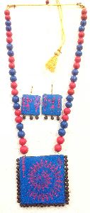 Designer Terracotta Necklace pieces are painted with bright and eye catching colours