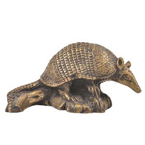 Bronze Armadillo Sitting on a Log