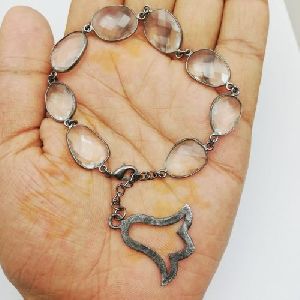 Gunmetal White Crystal Quartz Bezel Set Bracelet with Temple Bell Charm