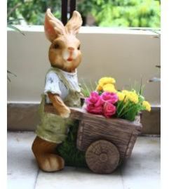 Rabbit pushing cart planter