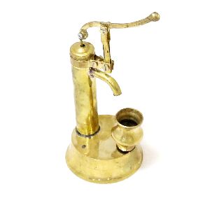 Brass colour metal hand pump