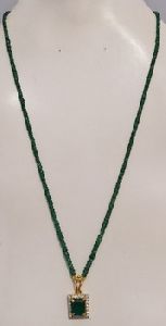 natural emerald and diamonds in gold pendant with emerald bead necklace