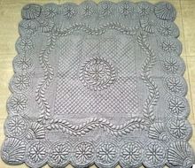 handmade trapunto quilt