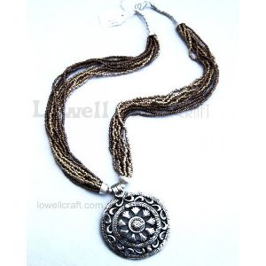 SEED BEAD NECKLACE WITH ANTIQUE METAL PENDANT