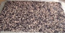 Leather shaggy rug carpet
