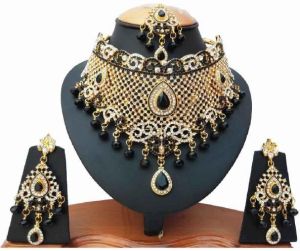 Catching Gold Plated Party Wear Handmade Ethnic Zircon Necklace set