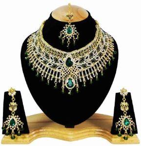 Designer Party wear Zerconic Necklace Set Earrings tika In Green