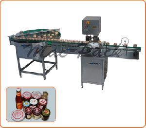 FULLY AUTOMATIC LUG CAPPING MACHINE.