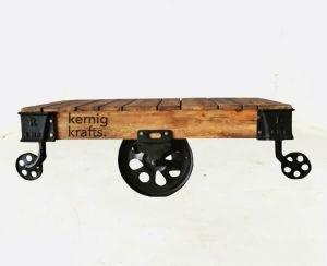 CAST IRON MANGO WOOD TOP MOVABLE WHEEL COFFEE TABLE