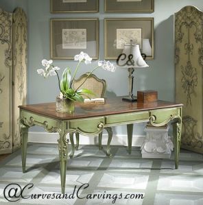 CARVINGS SIGNATURE COLLECTION TABLE