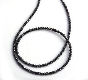 Black Faceted Diamond Beads