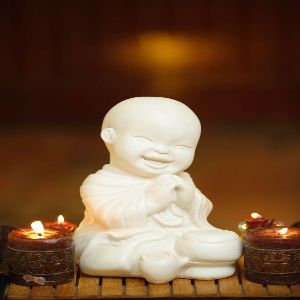 Monk sitting folded hands