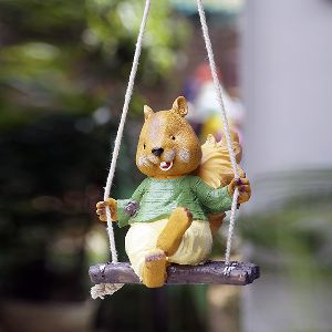 Squirrel on swing