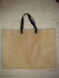 Natural jute bag with rexine handle