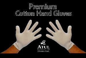 white cotton hand gloves