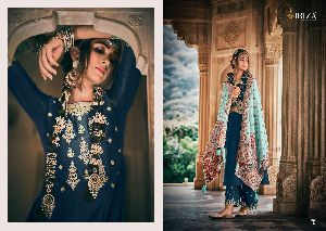 Designer Suit in Pure Silk With Neck And Sleeve Designer Work