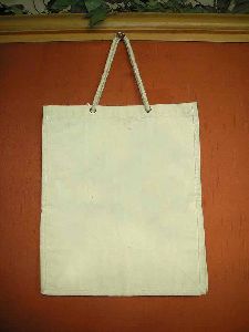 NATURAL COTTON BAG WITH ROPE HANDLE .