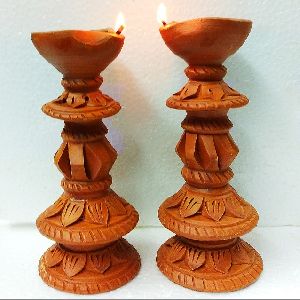 clay stand diya