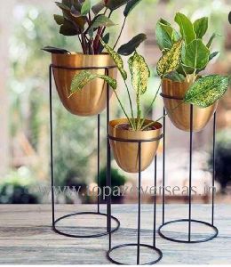 Metal plant stand with plant pot