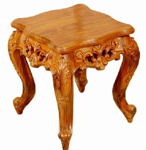 Carved wooden table in Teak Wood