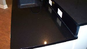 glossy black floor tiles
