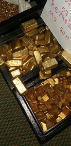 Raw gold bars