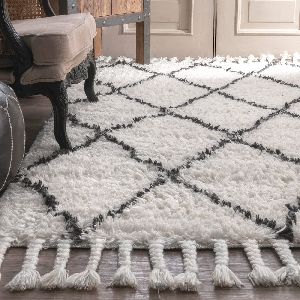 White & green saggy rugs