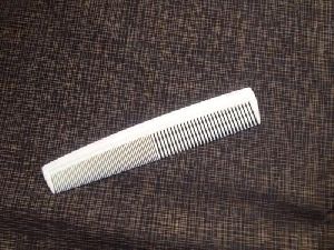 White Handle Plastic Pocket Comb