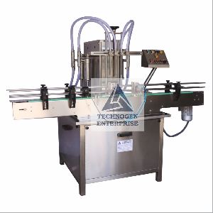 AUTOMATIC 4 Head VOLUMETRIC BOTTLE LIQUID FILLING MACHINE