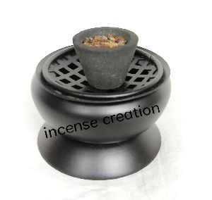 Iron incense burner.