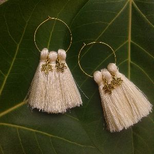 off-white earrings (fabric)