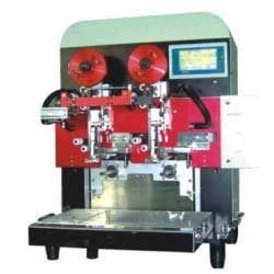 coil tapping machine