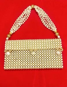 Ladies Gold Moti Purse