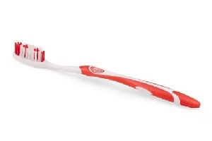 Red Plastic Toothbrush
