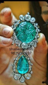 Carved emerald pendant