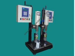 HEAD BOTTLE FILLING MACHINES